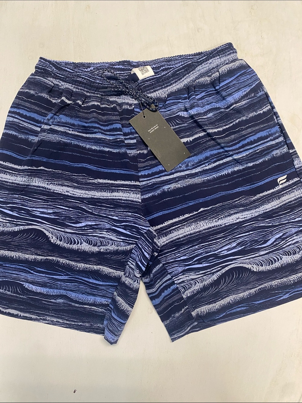 Fabletics Men's Navy and Light Blue Striped Swim Trunks
